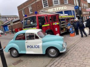 Read more about the article Fire engine and vintage police car all …